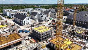 Blick auf eine Baustelle von Neubauwohnungen in Kirchheim bei München. | picture alliance / SvenSimon